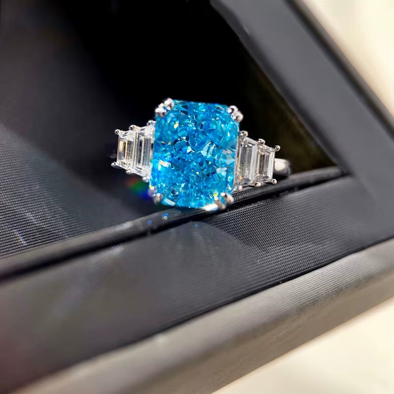 F1165 Women'S 925 Sterling Silver Ring with Blue Topaz Emerald-Cut Prong Setting Geometric Engagement Jewelry
